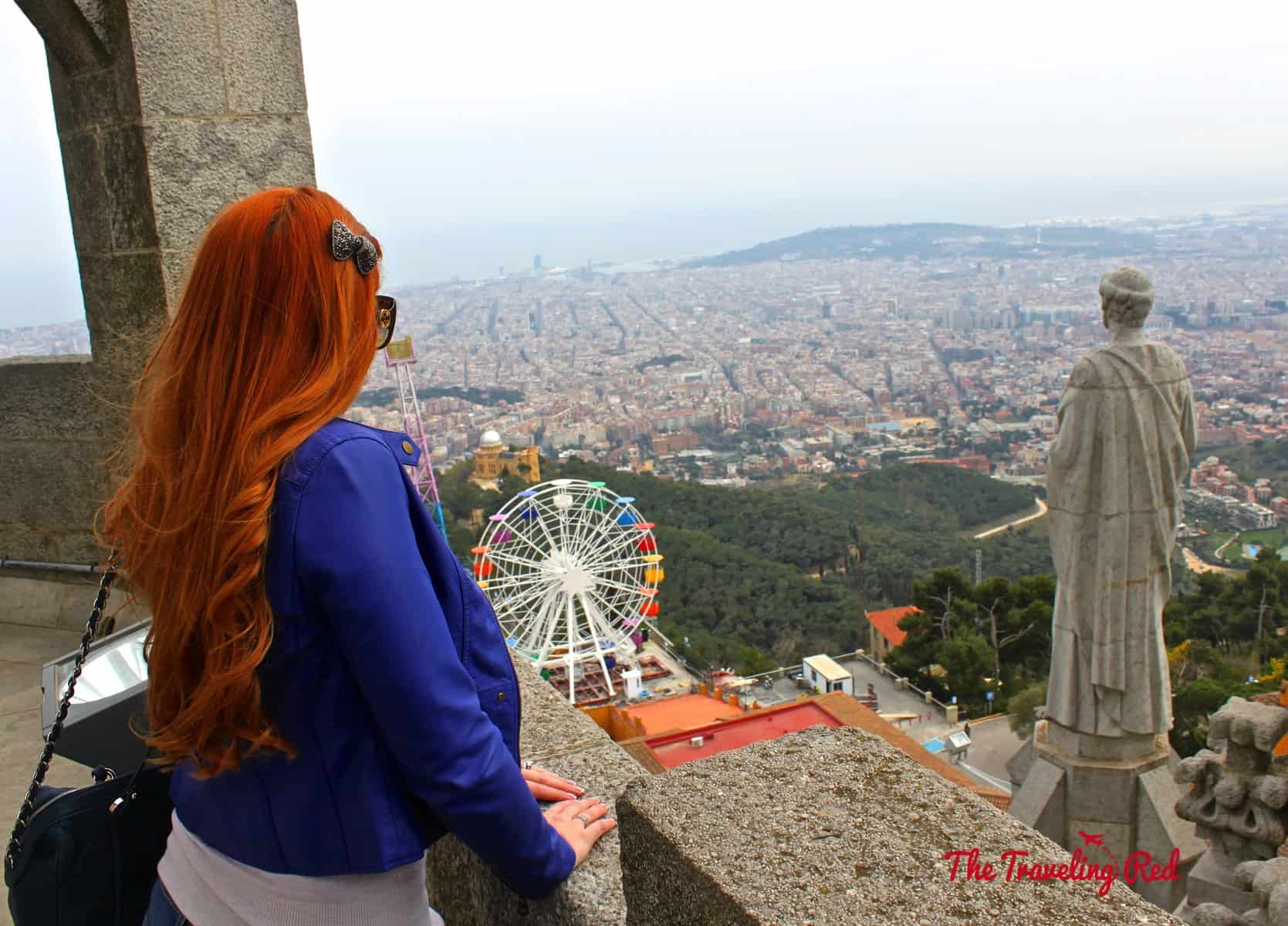 The view of the amusement park in Tibidabo overlooking Barcelona, Spain from the Sagrat Cor (the church at the summit). Tibidabo is a mountain with an amusement park and church. It is the highest point in the city with incredible sweeping views of the city.