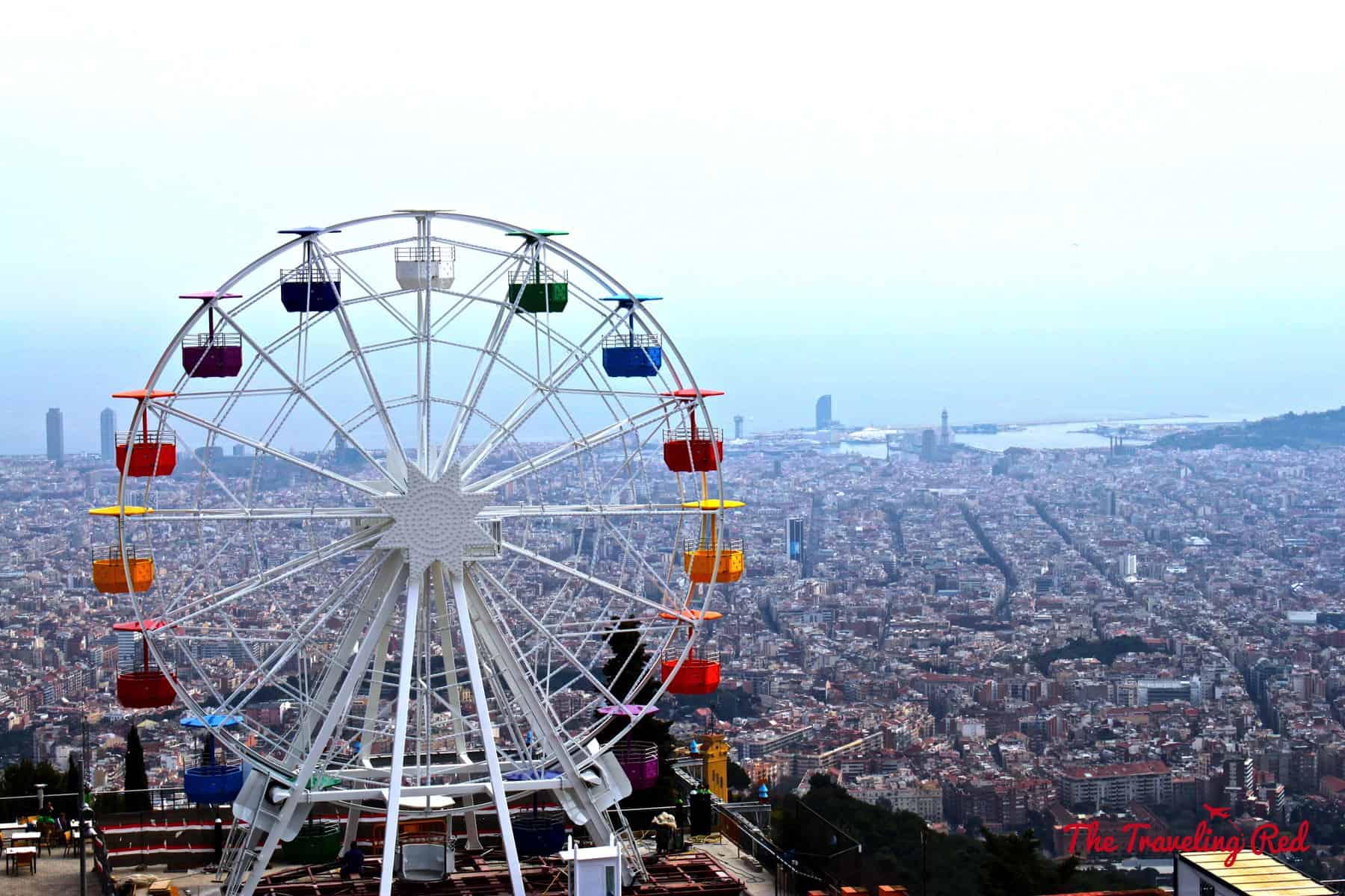 The amusement park overlooking Barcelona, Spain in Tibidabo. Tibidabo is a mountain with an amusement park and church on the summit. It is the highest point in the city with incredible sweeping views of the city.
