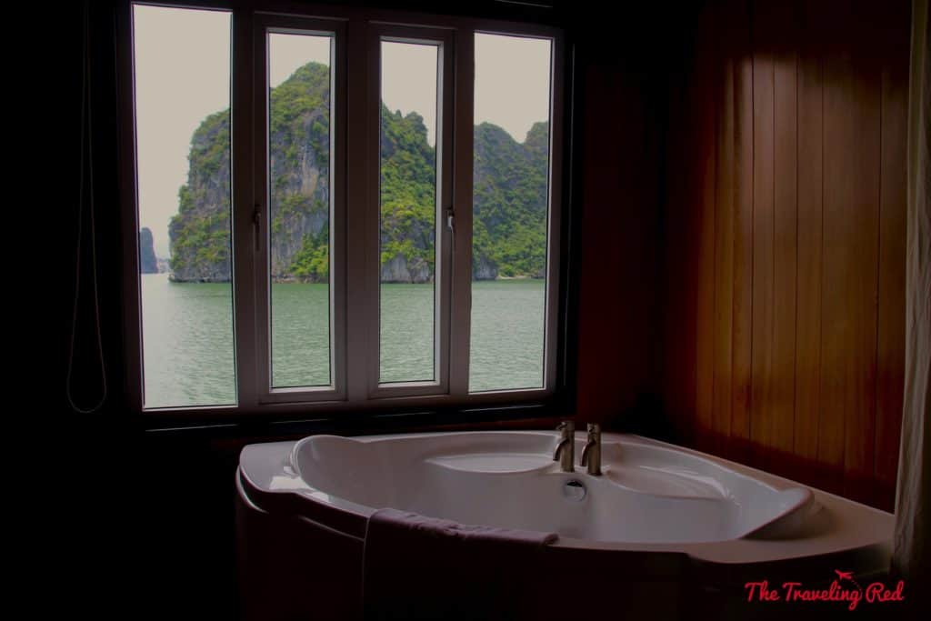 The incredible jacuzzi bathtub with big windows in our cabin on the cruise. Romantic cruise in Bai Tu Long Bay, right next to Halong Bay, Vietnam, aboard the Dragon Legend Cruise ship. The best honeymoon destination in Asia. #Halongbay #Vietnam #cruise #honeymoon #honeymoondestination