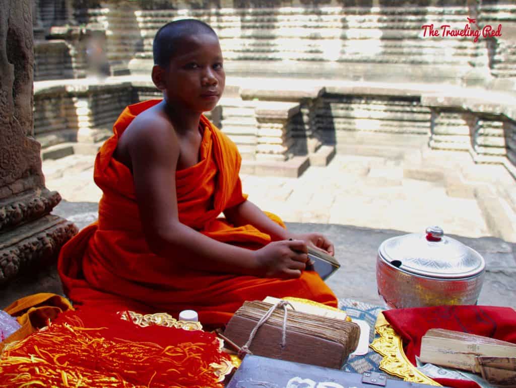 Young Monk in Angkor Wat | Cambodia Temples | Siem Reap | Angkor Wat | Angkor Passes | Photography Tour | Angkor Archeological Park | Ta Prohm | Tomb Raider | Banteay Kdei | Ta Nei | North Gate | Bayon | Wat Thmey | Monks | South Gate | Preah Khan    #siemreap #angkorwat #cambodia