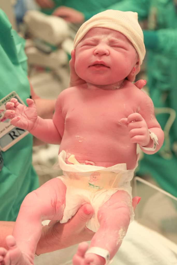 Baby's first photo - newborn photo in the hospital - seconds old