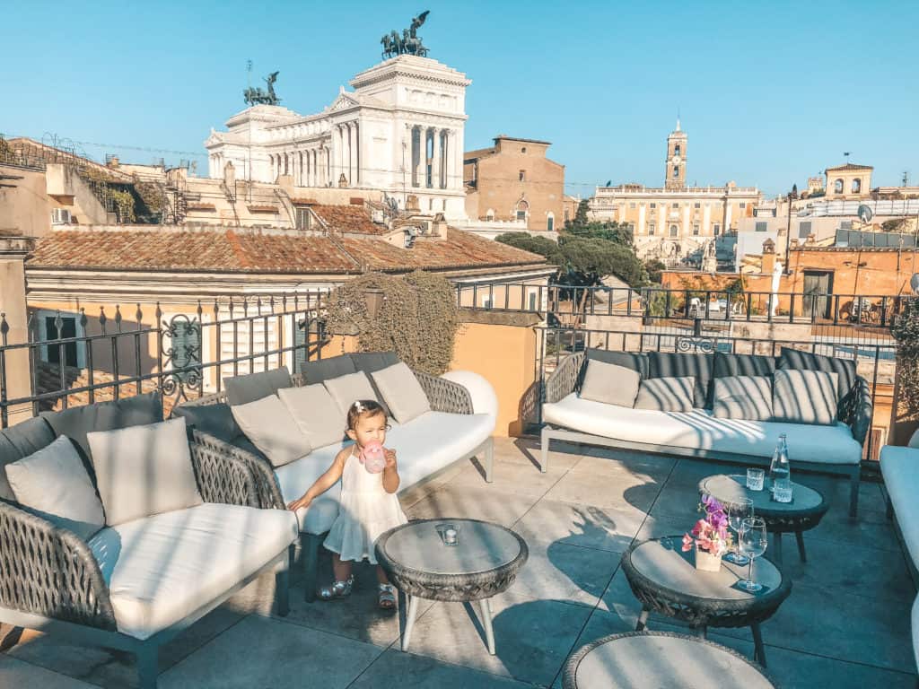 The view from the rooftop bar at the Otivm Hotel in the city center of Rome, walking distance from most of the main sites. It's a budget friendly boutique hotel with great service and super spacious rooms - ours even had a king size bed. Rome | Italy | budget friendly boutique hotel | great service | spacious rooms | king size bed | rooftop bar overlooking the city | best hotel #rome #italy #italia #otivmhotel #besthotel #rooftopbar