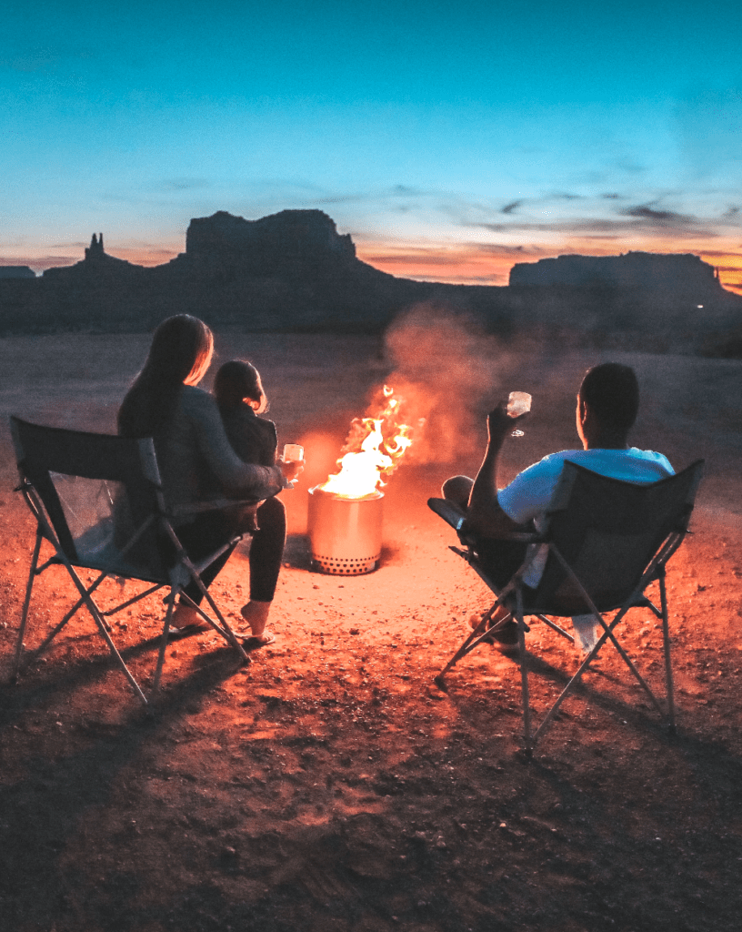 Camping right outside Monument Valley in Utah. Our favorite sunsets during our 3 month road trip in the United States were spent by our Solo Stove.  Utah became one of our favorite places to visit in our school bus conversion, 2 Cool 4 Skool Bus, the Skoolie. Check out all the places you can't miss. Add them to your travel itinerary now.