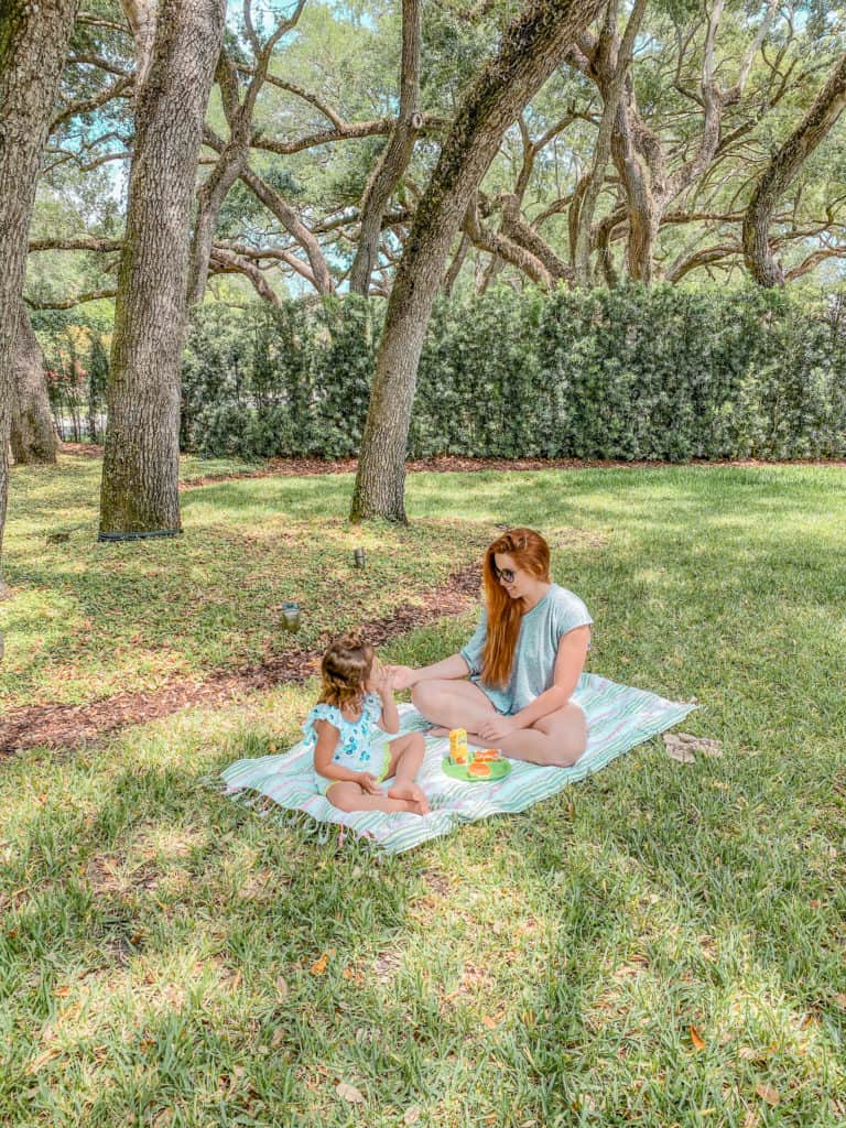 Quarantine Activities for Toddlers & Kids by The Traveling Red - Picnic Lunch under the trees