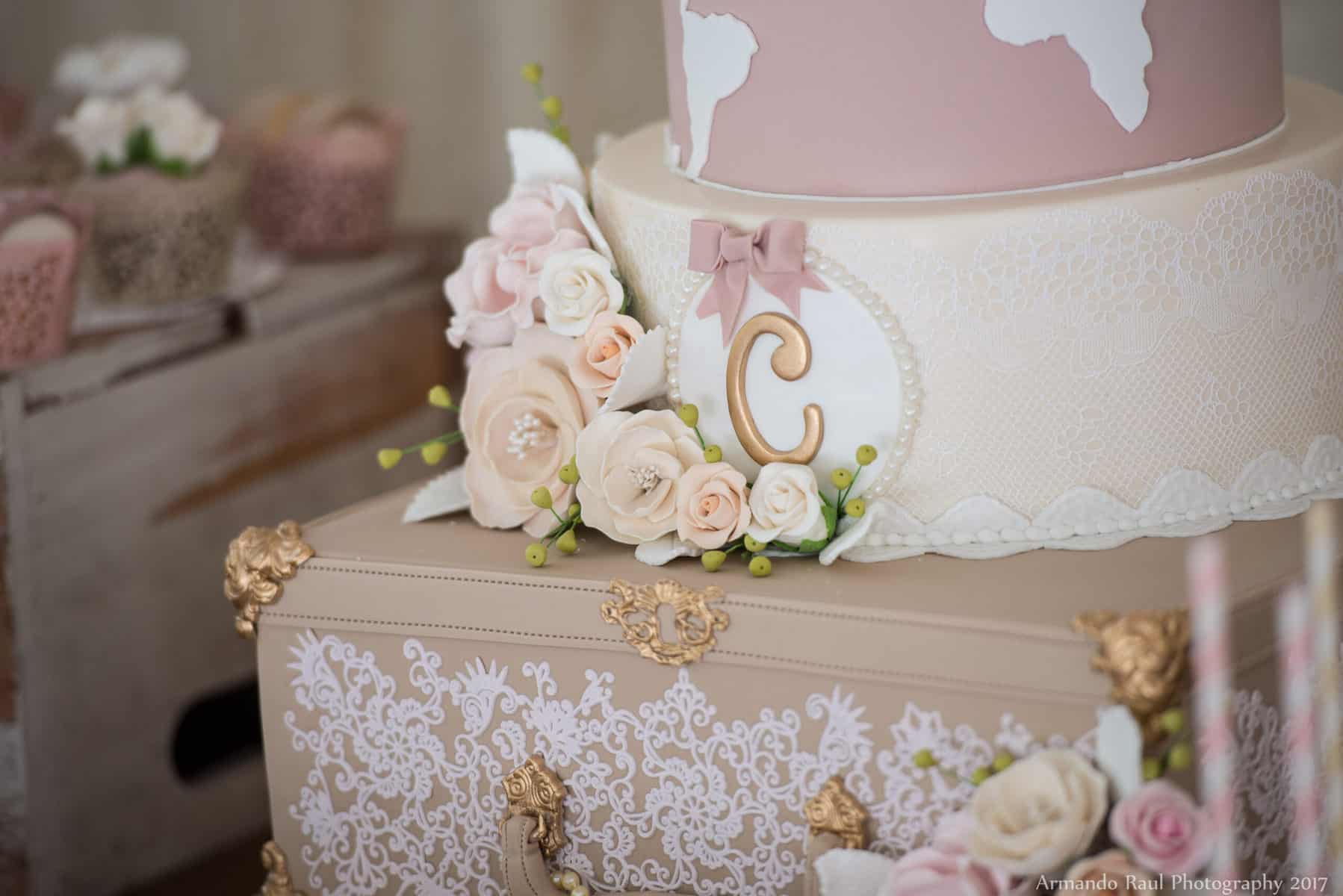 Girl Baby Shower Cake with Vintage Luggage, Lace, Pink, Flowers, Pearls, Bows & a World Map | Vintage Travel Theme Baby Shower | Baby Girl | You Are My Greatest Adventure | Lace, World Map, Flowers, Cameras, Vintage Decor | Cake, Sweets, Desserts, Lounge Seating Area, World Cuisine, Food Stations, Seating Arrangement | Home Baby Shower | Blush Pink, Beige, Gold, Champagne, White