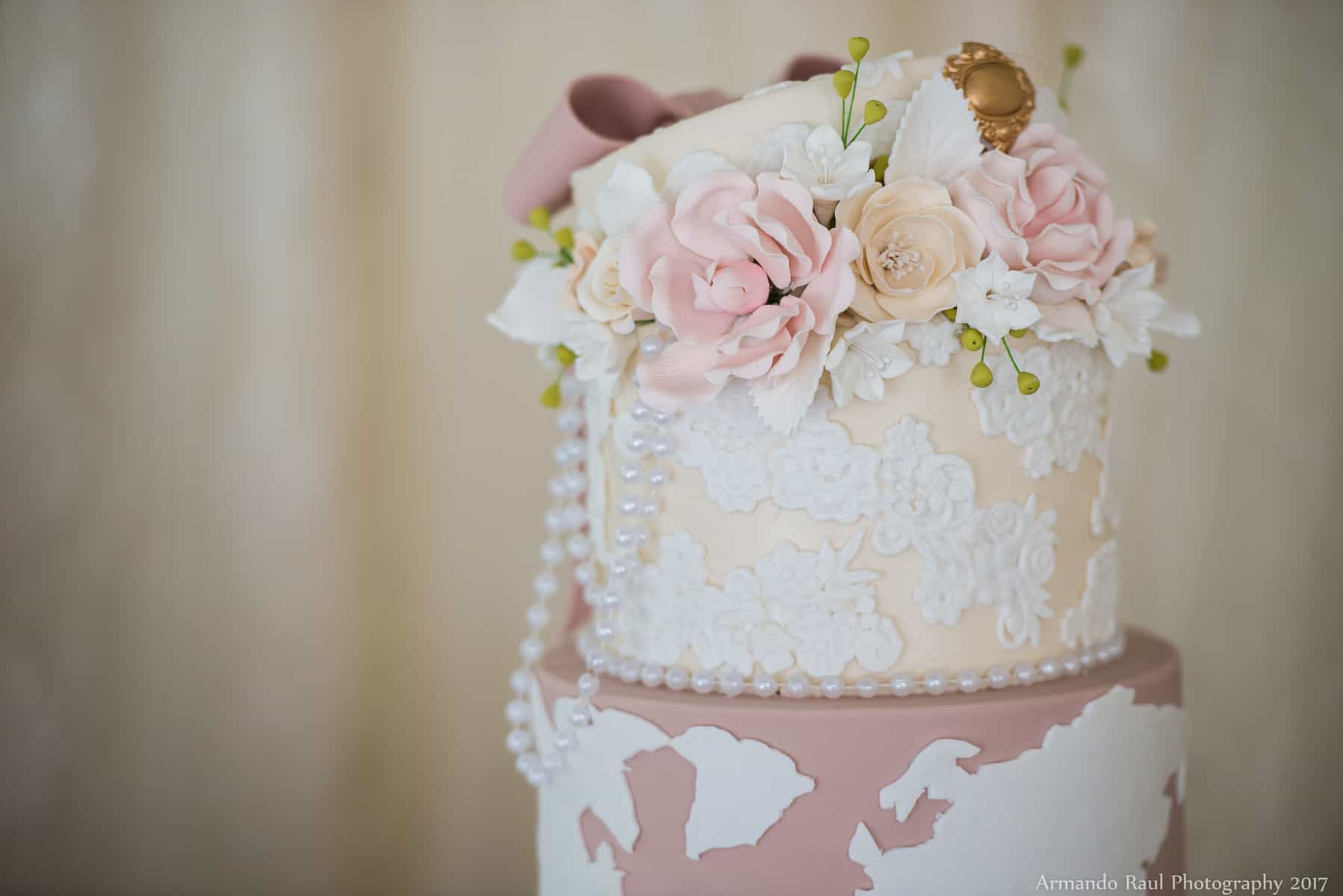 Girl Baby Shower Cake with Vintage Luggage, Lace, Pink, Flowers, Pearls, Bows & a World Map | Vintage Travel Theme Baby Shower | Baby Girl | You Are My Greatest Adventure | Lace, World Map, Flowers, Cameras, Vintage Decor | Cake, Sweets, Desserts, Lounge Seating Area, World Cuisine, Food Stations, Seating Arrangement | Home Baby Shower | Blush Pink, Beige, Gold, Champagne, White
