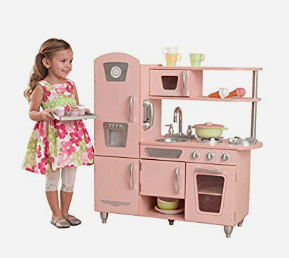 Organized Pretend Play Kitchen - everything you need to fill the cutest little kitchen with everything your girl or boy needs to play in an organized manner. Everything has a perfect spot. I linked every item and shared both girl and boy options perfect for pretend play. The perfect present for a toddler for a birthday or the holidays. | Cutting Food, Fruits & Veggies | BBQ Grilling Set | Plates & Utensils | Small Kitchen Appliances | Blender, Mixer, Toaster, Coffee Maker | Apron & Oven Mitts | Pizza, Cookies & Baking Sheets | Organized Clear Bins | #PretendPlay #PlayKitchen #LittleKitchen #Organization #Organizing