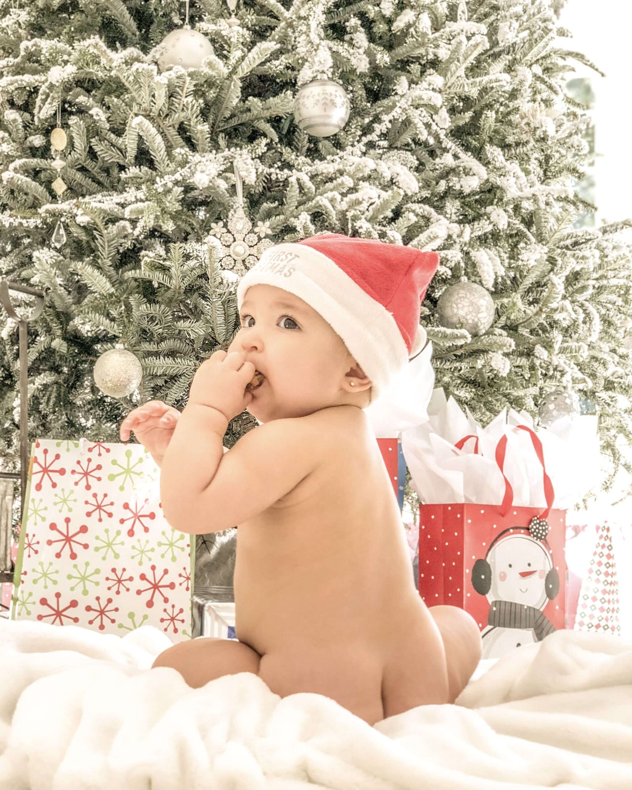 Baby and toddler girl Christmas pictures inspiration at each age. Fun Christmas photos perfect for each age during the holiday time. From baby's first Christmas, to meeting Santa and becoming a big girl with her own christmas tree in her room. #ChristmasPictures #ChristmasInspo #ChristmasBaby #Santa #Babys1stChristmas 