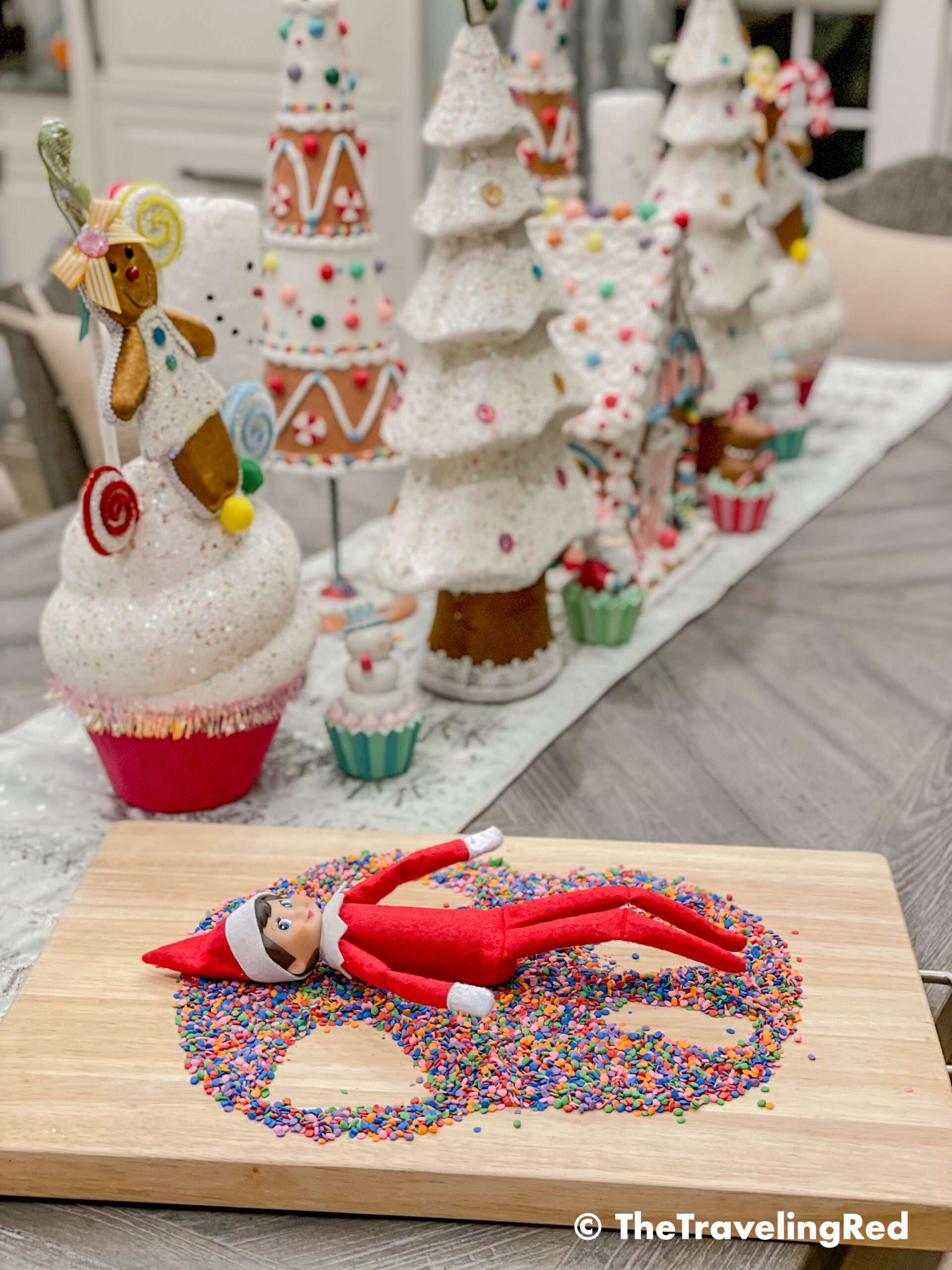 Naughty Elf on the shelf used sprinkles to make a snow angel. Fun and easy elf on the shelf ideas for a naughty elf that are quick and easy using things you have at home.