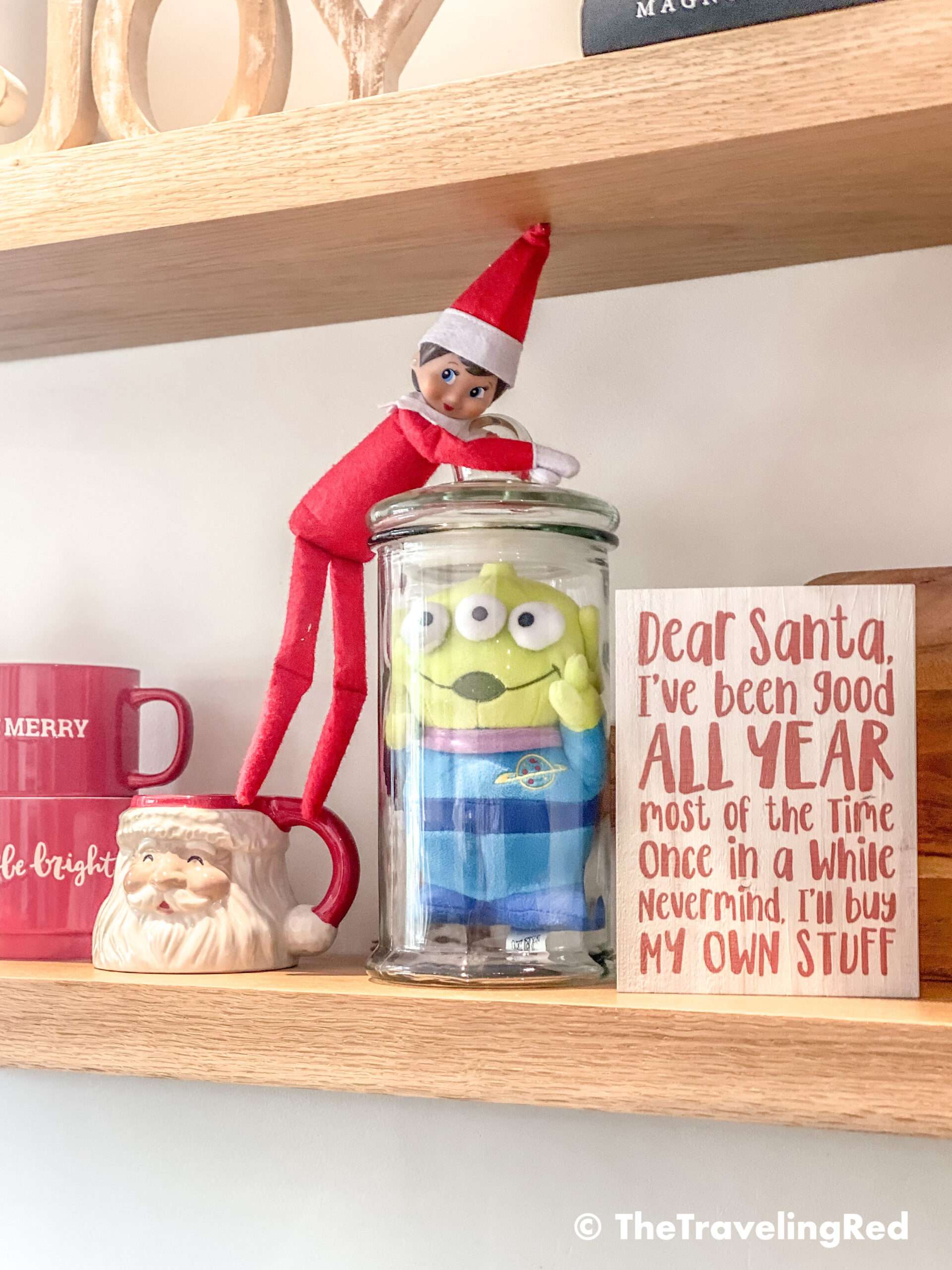 Naughty Elf on the shelf trapped a toy in a glass jar and wouldn't let him out.  Fun and easy elf on the shelf ideas for a naughty elf that are quick and easy using things you have at home.