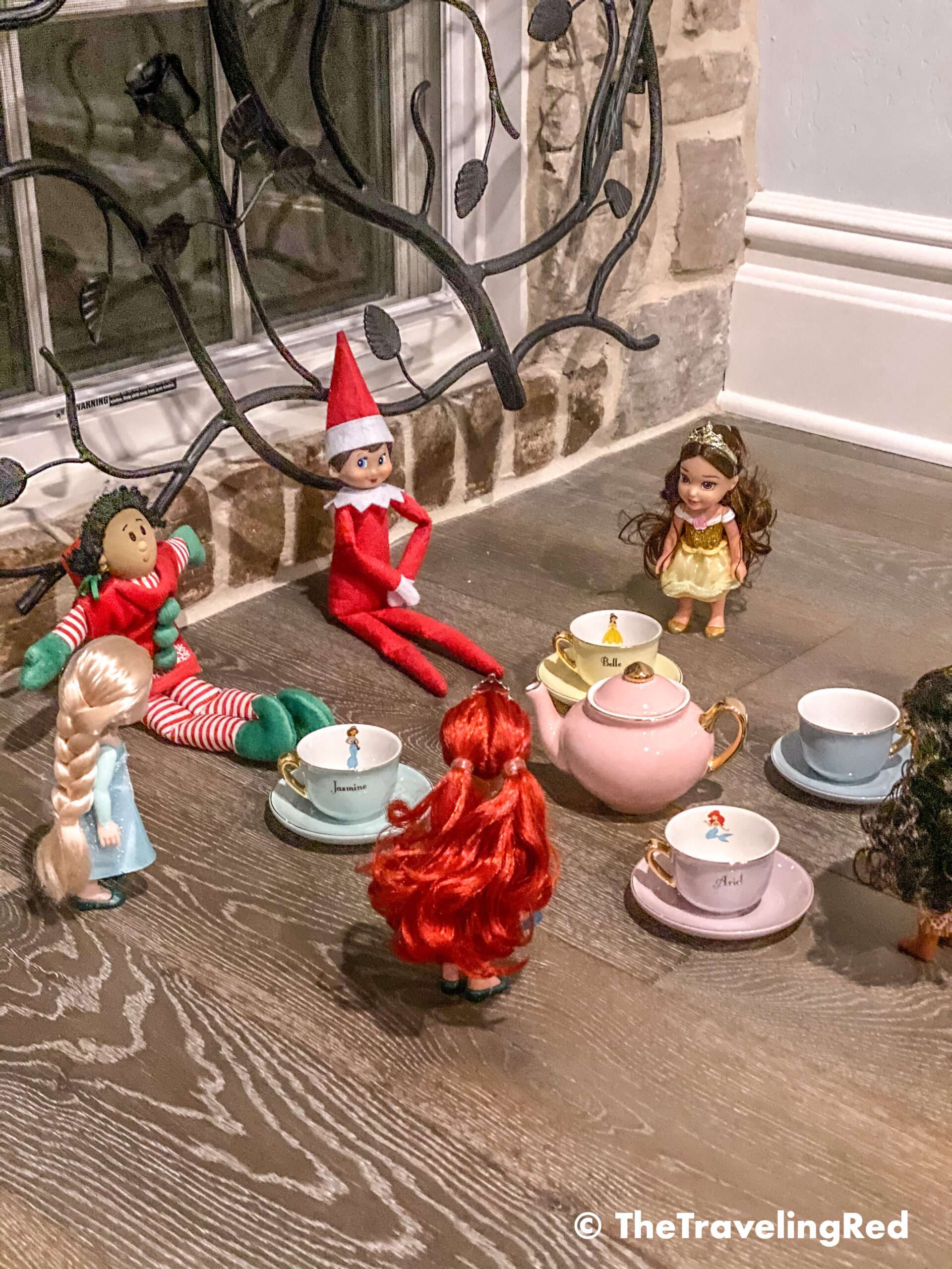 Naughty Elf on the shelf hosting a princess tea party. Fun and easy elf on the shelf ideas for a naughty elf that are quick and easy using things you have at home.
