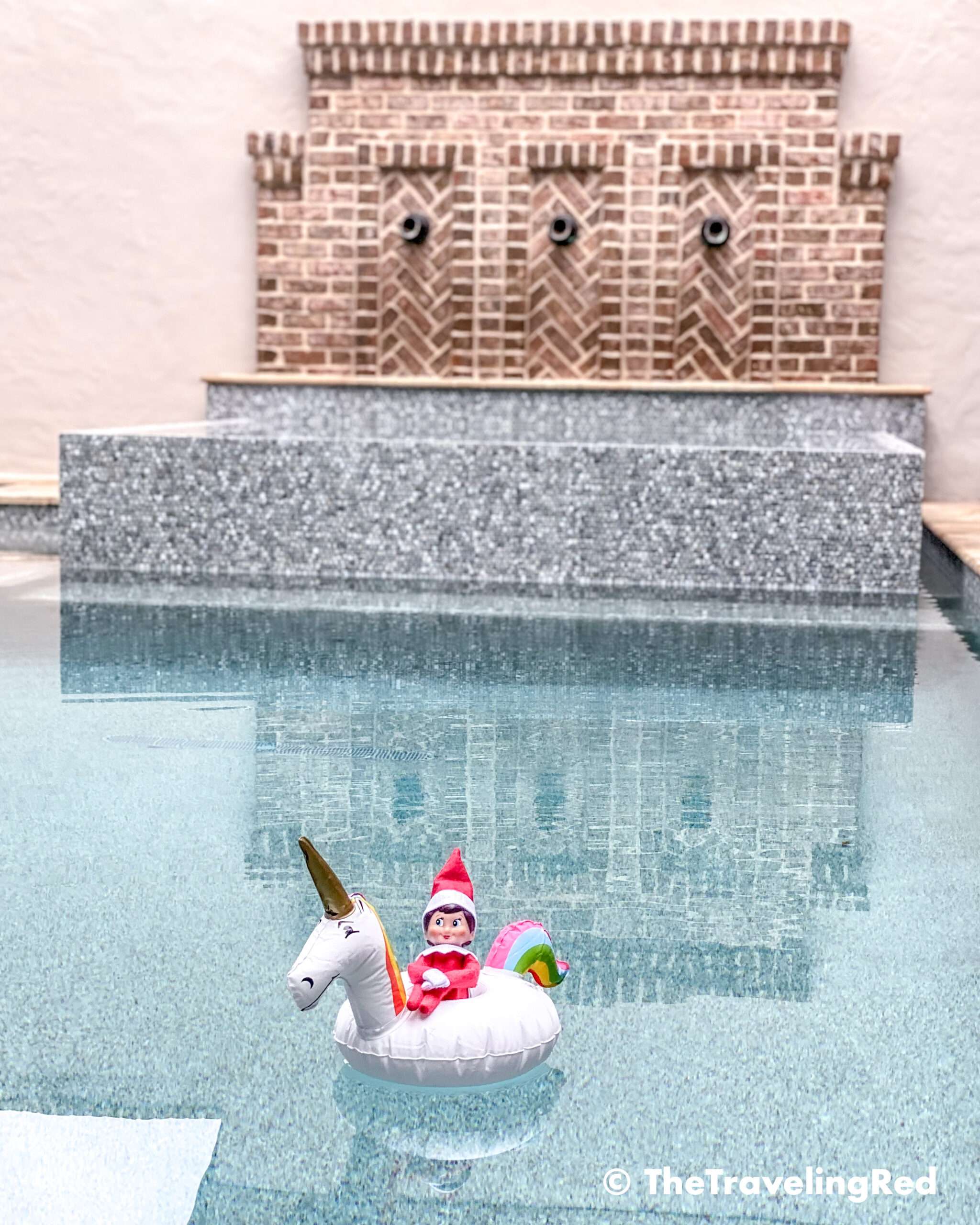 Naughty Elf on the shelf used a unicorn cup float to lounge in the pool. Fun and easy elf on the shelf ideas for a naughty elf that are quick and easy using things you have at home.