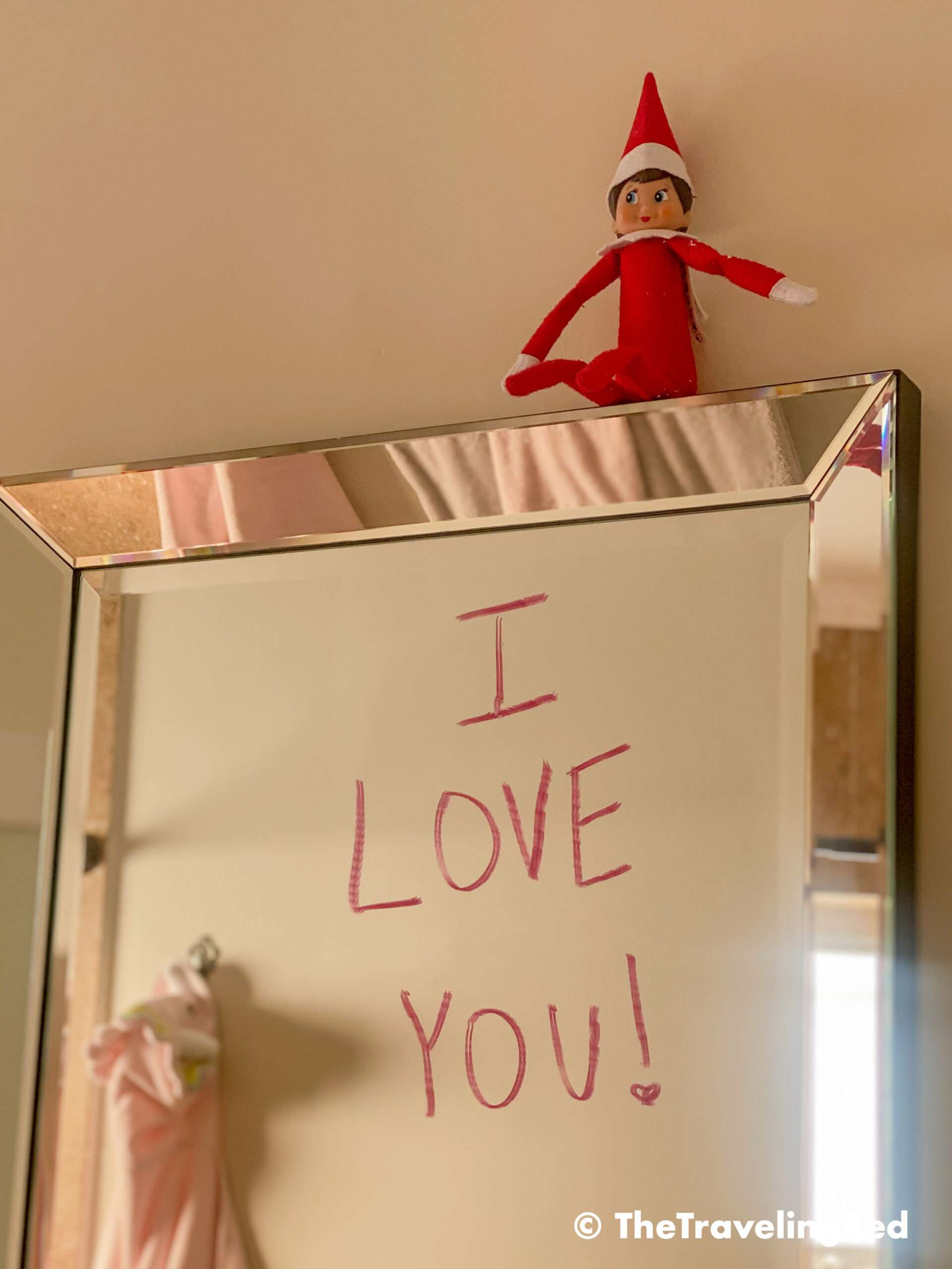 Naughty Elf on the shelf wrote a note on the bathroom mirror using mommy's red lipstick. Fun and easy elf on the shelf ideas for a naughty elf that are quick and easy using things you have at home.